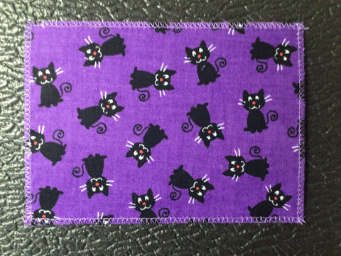 Black Cats on Purple